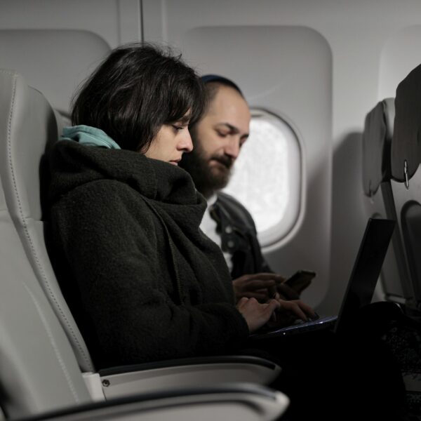 Young people travelling on holiday trip with aerial transportation